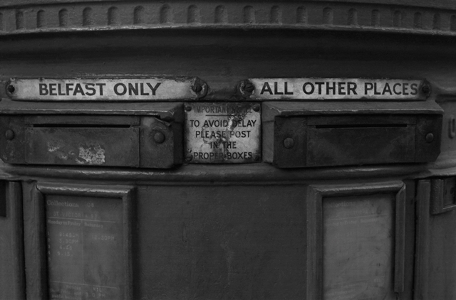 Post Box on Great Victoria Street with Belfast plates to prevent letter bombs, 1975.